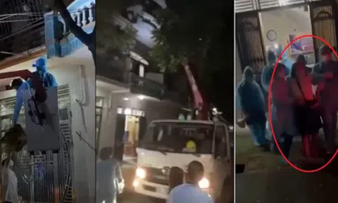 Cố thủ tại tầng 3 của căn nhà, công an dùng cần cẩu để tiếp cận F1 trốn cách ly